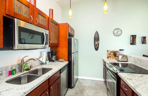 Wailua Condo | Pacific+Pool+Palms! Luxe w/Chic Kitchen, Lanai, Den, WiFi–Kauai Kailani K303