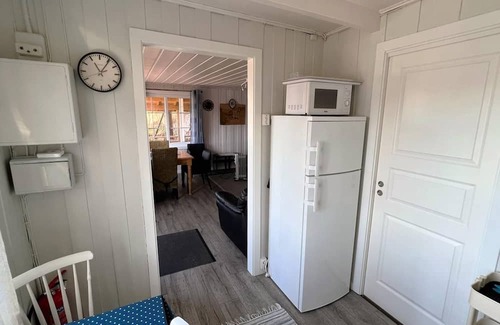 Lindesnes House | Holiday home 'Naversund', reduced price, off the island of Furuholmen near Lindesnes in a secluded location with a view of the fjord, Agder, southern Norway, up to 8 people, 4 bedrooms, 2 shower rooms, 2 WC, 50 m² terrace, Internet WIFI, jetty an.