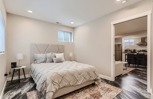 Aurora House | Chic, Modern and Cozy Basement with Garage