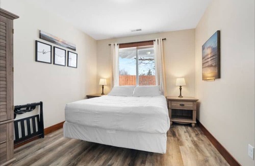 Houghton House | Cabins 3 & 4 - Pontoon boat, snowmobile rentals available next door!