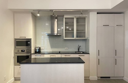 Central Waterfront House | Elite Urban Lodgings | Executive Escape