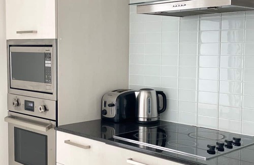 Central Waterfront House | Elite Urban Lodgings | Executive Escape