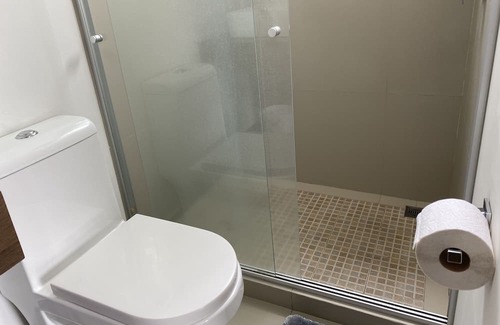 Carmen Apartment | Habitación con Baño Privado y Estacionamiento