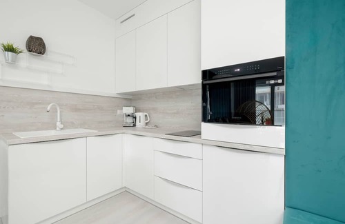 Rogowo Apartment | Turquoise Apartment Rogowo by Renters
