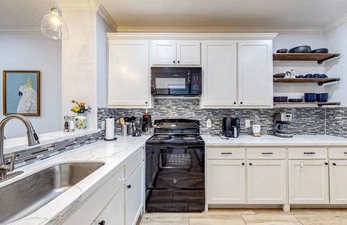 Seven Coves House | Elegant lakefront escape with private balcony, W/D, & gorgeous lake views