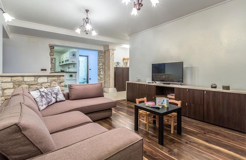 Lovrecica Apartment | Enjoy relaxing hours in this centrally located vacation apartment.