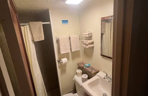Onalaska House | Overlooking Lake Onalaska--Private Bedroom/Bathroom; fish cleaning room onsite