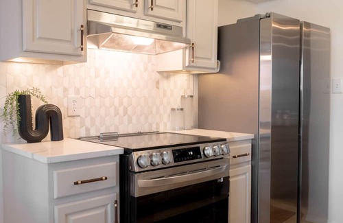 South Tulsa Apartment | Designer Condo in gated community, Walkable to Whole Foods, Starbucks, + CVS