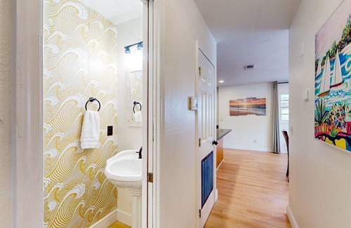 Carrollwood House | Lakefront home with private patio, waterfront sitting area, & W/D