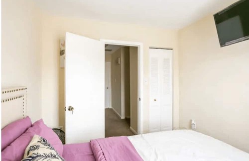 Wheaton House | Convenient Living: Walk to Metro TV in Bedroom. Ideal for a Restful Sleep