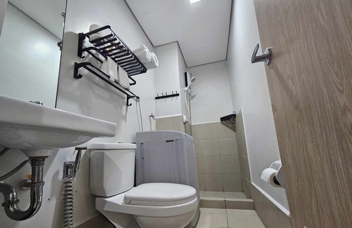 Marilao Condo | 5 minutes to SM Marilao! Family-size condo with Smart Tv for Netflix.
