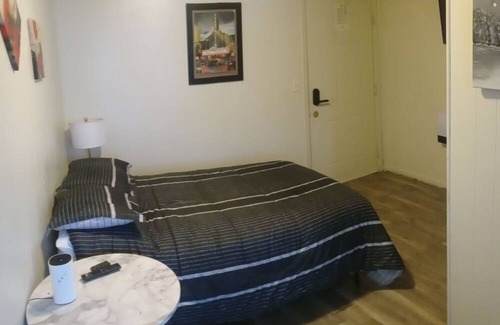 Savage House | Affordable cozy room meets unbeatable convenience.