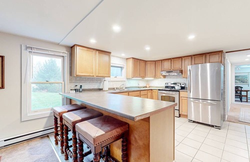 Newfane House | 1900 farm property with old-world ambiance, updated kitchen, & mountain views