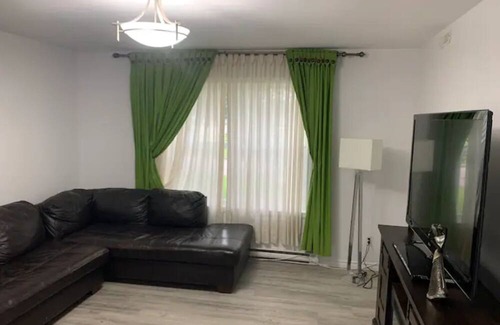 Brandon Apartment | Comfortable Stickney bedroom.