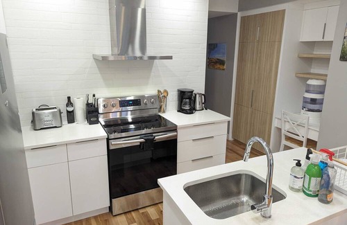Verdun Condo | Cozy, modern, house-like condo, big backyard, sunny deck, space for 2 cars