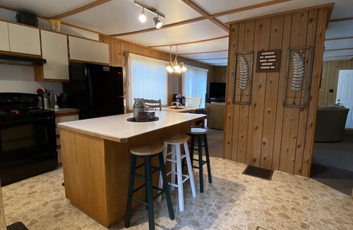 Denare Beach Cottage | Cozy Private lake front cabin with sand beach!