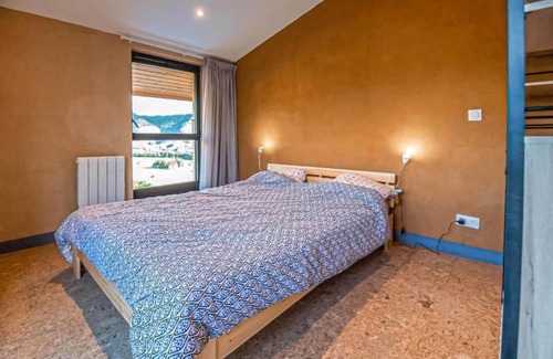 Marcoux Apartment | This beautiful and modern vacation home welcomes you with a breathtaking mountain view.