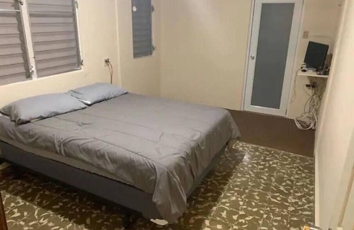 Mayaguez Pueblo House | Nice House near University of Mayaguez with covered and gated car parking.