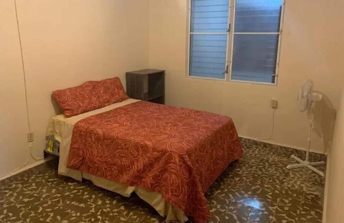 Mayaguez Pueblo House | Nice House near University of Mayaguez with covered and gated car parking.