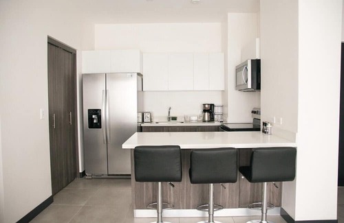 Guacima Condo | Great apartment near the Airport with Air Condit.
