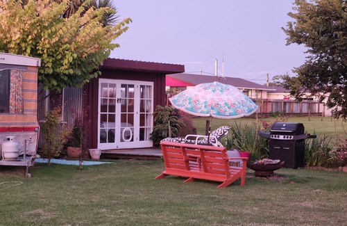 Westport Cottage | Unique, delightful Tiny Home with Alfresco living area including retro Poptop.