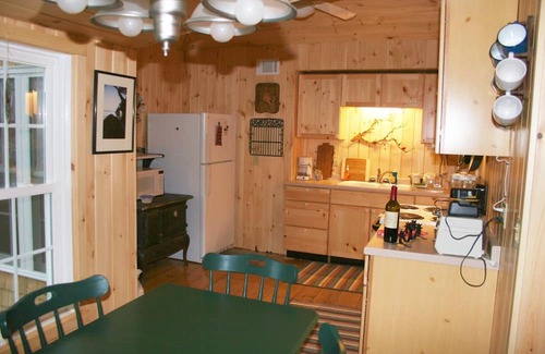 South Casco Cottage | Vintage cottage with beautiful mountain views across Sebago Lake.