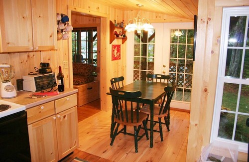 South Casco Cottage | Vintage cottage with beautiful mountain views across Sebago Lake.