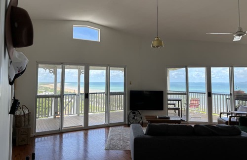 Yeppoon House | Yeppoon beachside oasis with epic island views, gorgeous breezy deck & air con
