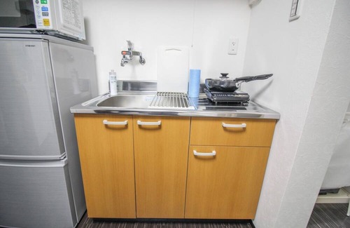 Ikuno House | 64 sqm Renovated Home 5 Minutes from Kitatatsumi Station Direct Access to Namba Kuromon Market - LIVING TERRACE HOUSE / Osaka Ōsaka