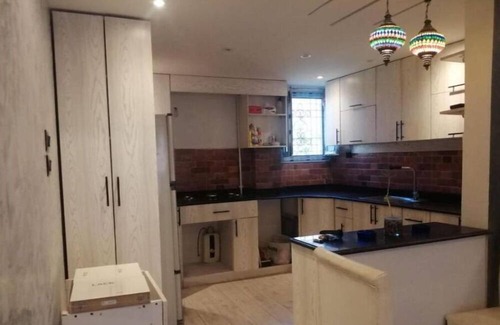 Al Duqqi Apartment | The Art Home / Dokki apartment