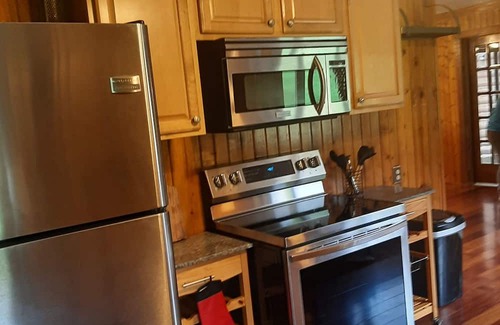 Elkton Other | Log cabin style duplex on 150 acres of beautifully serene wooded farmland