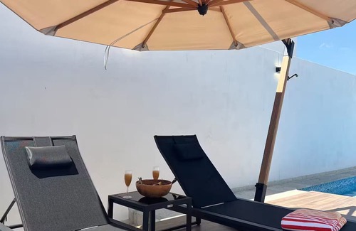 San Luis Potosi Apartment | Carranza Views! Heated Pool, KingBed & WorkSpace