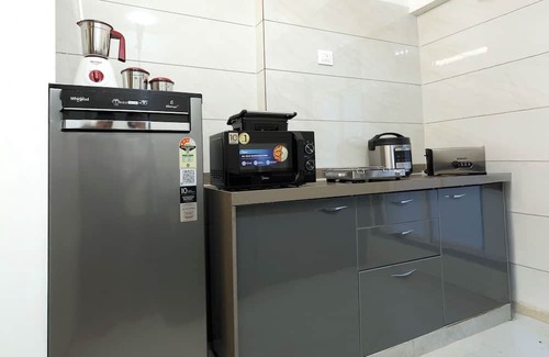 Andheri East Apartment | The Art of Comedy – Welcome Inspired Stay