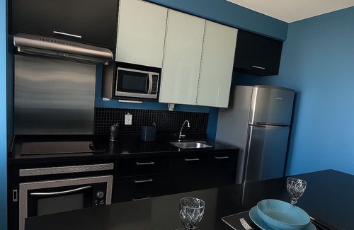 Brooklin Paulista Apartment | Studio - Campo Belo with Metro in Front and Rooftop with Sunset.