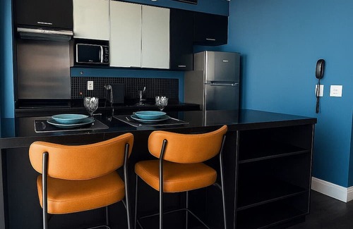 Brooklin Paulista Apartment | Studio - Campo Belo with Metro in Front and Rooftop with Sunset.