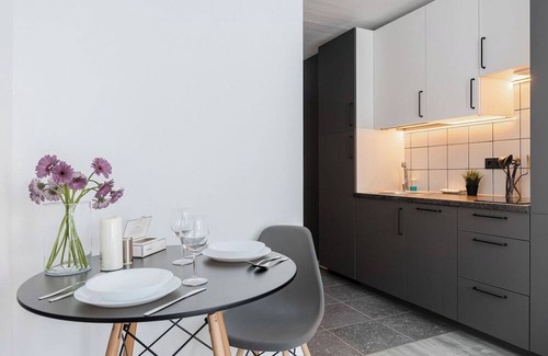 Business District Apartment | River to the City Self check in