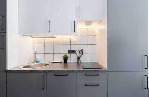 Business District Apartment | River to the City Self check in