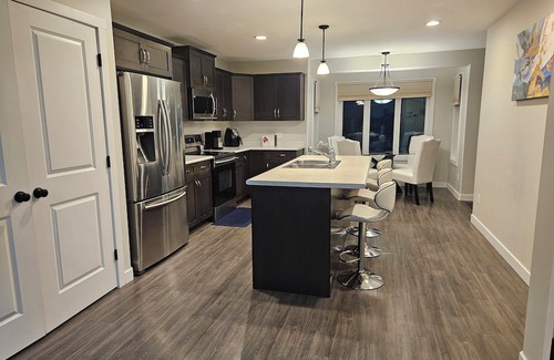 Regina House | Comfy 3-bedroom house in Harbour Landing, Regina.