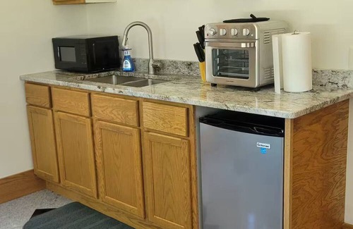 Decorah Apartment | Modern Comfort Riverview Stay