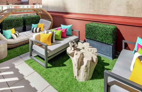 Garment District House | Vibrant Terrace Escape with Stylish Decor and Relaxing Outdoor Space in Midtown