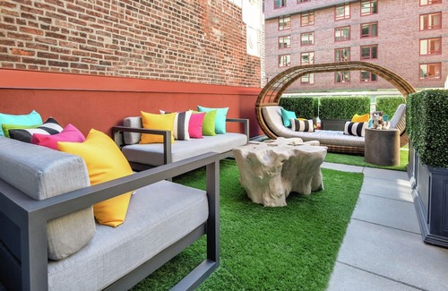 Garment District House | Vibrant Terrace Escape with Stylish Decor and Relaxing Outdoor Space in Midtown