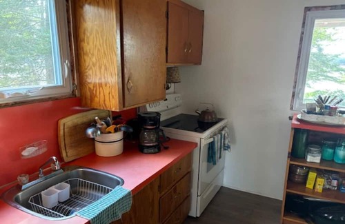 Bayview Cottage | Cozy Cottage, waterfront, pet friendly, very close to attractions/theme parks.