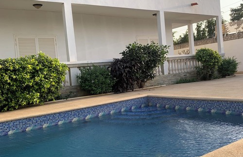 Saly Cottage | Spacious 4 bedroom cottage in charming Saly with WiFi, AC Rent rooms