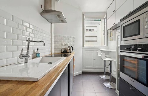 Clichy Apartment | Elegant, peaceful Haussmann-style apartment in a charming tree-lined street.