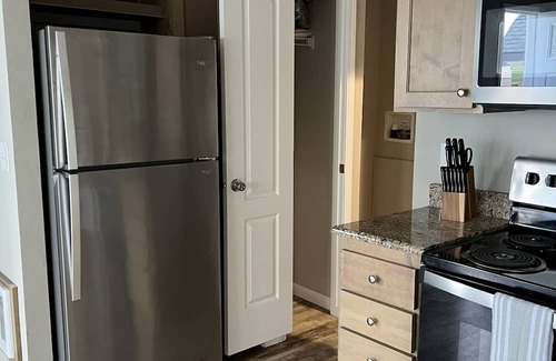 Moses Lake House | Charming bungalow on legacy golf coarse next to potholes reservoir.