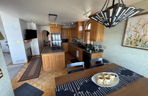 Spirit Lake House | Adorable FAMILY FRIENDLY 4-bedroom Lakeside Rental With Private Fishing Dock