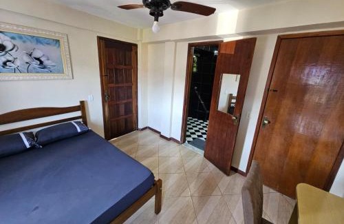 Quitandinha House | Suíte privativativa entrada independente com garagem