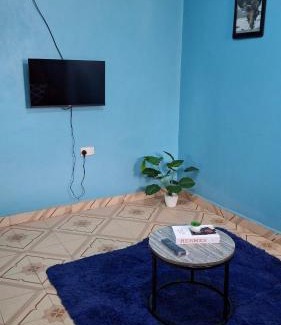 Ngelani House | Purple building