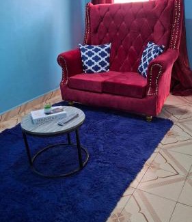 Ngelani House | Purple building