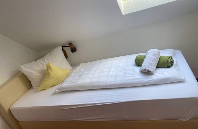 single room with shared bathroom and kitchen